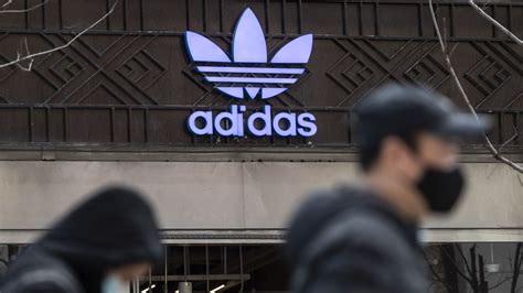 Two employees leave Adidas after probe of China corruption claims